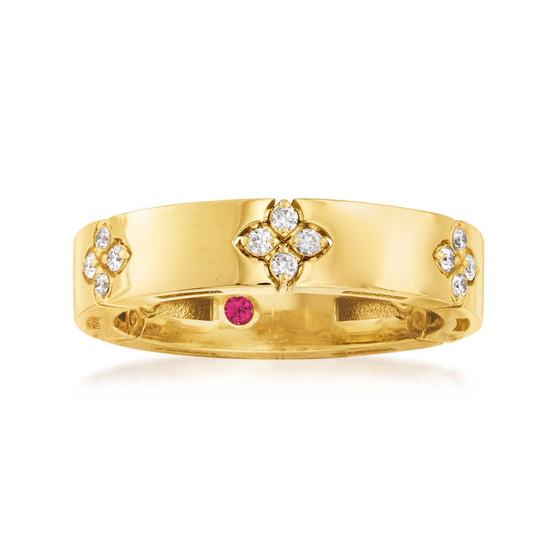 18kt yellow gold diamond flower ring with round red center stone and side diamonds