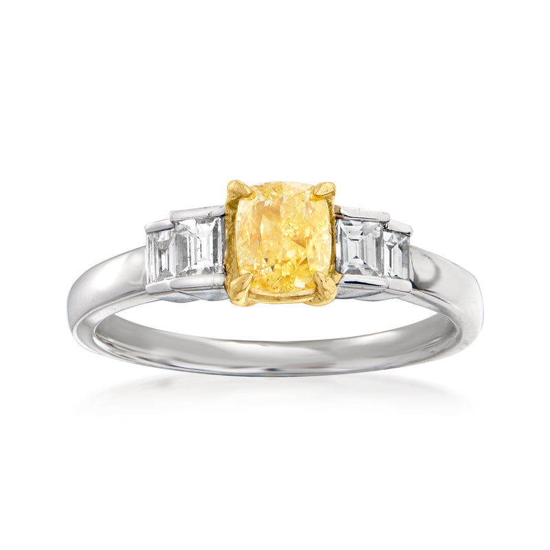 Two-tone gold diamond ring with cushion yellow center stone and baguette side diamonds
