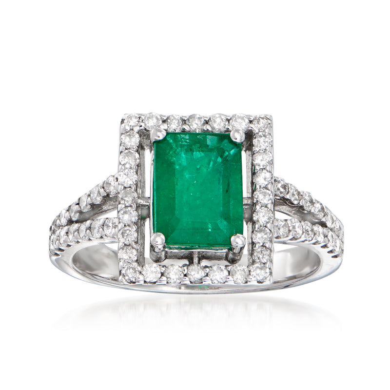 Emerald-cut green gemstone ring with diamond halo in 14kt white gold band