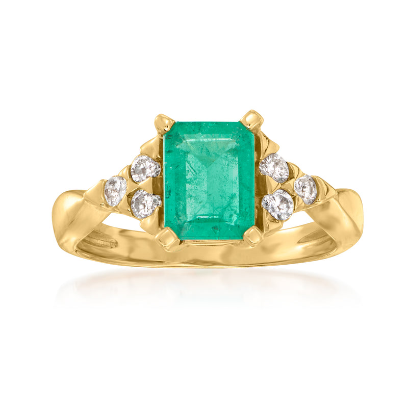14kt yellow gold ring with emerald-cut green gemstone and round diamond halo