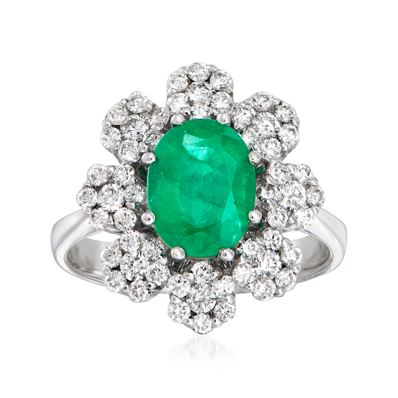Emerald-cut green gemstone flower ring in 14kt white gold with diamond halo