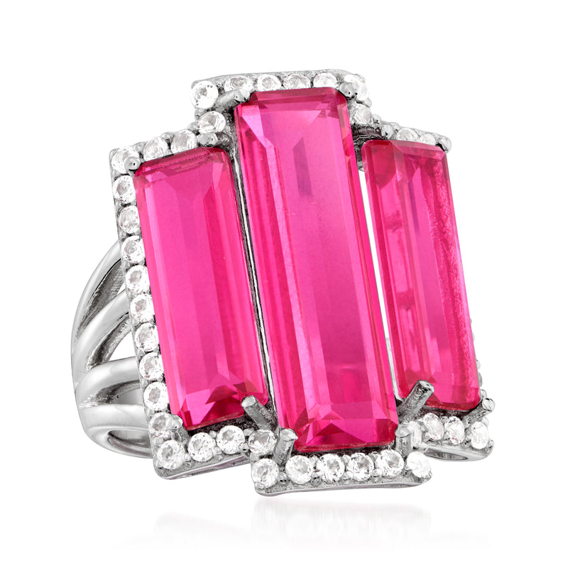 Sterling silver ring with central pink gemstone and two side baguette pink stones