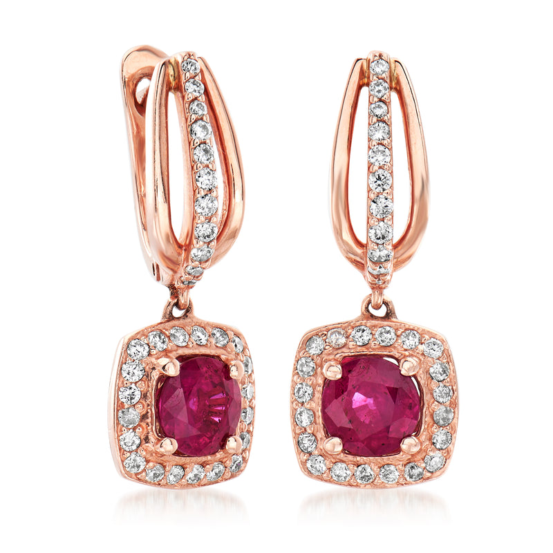 Rose gold hoop drop earrings with purple center stone and diamond border around halo