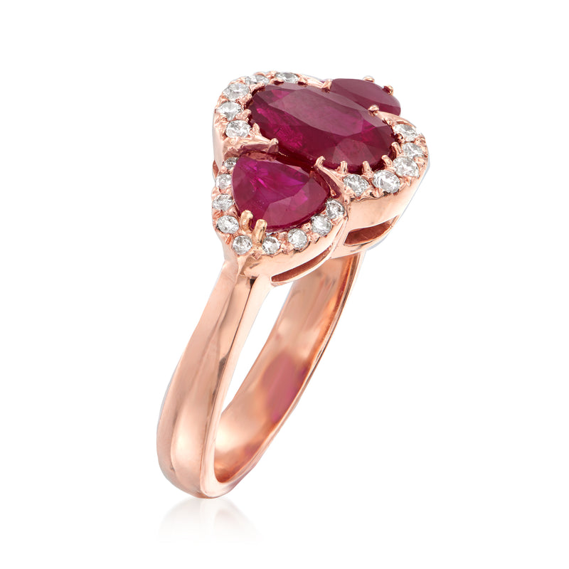 14kt rose gold ring with large oval ruby and round diamond halo, split band