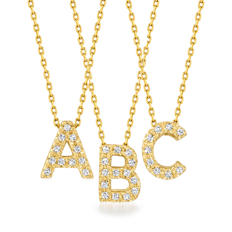 Diamond initial necklace set with A, B, and C pendants in 14kt yellow gold