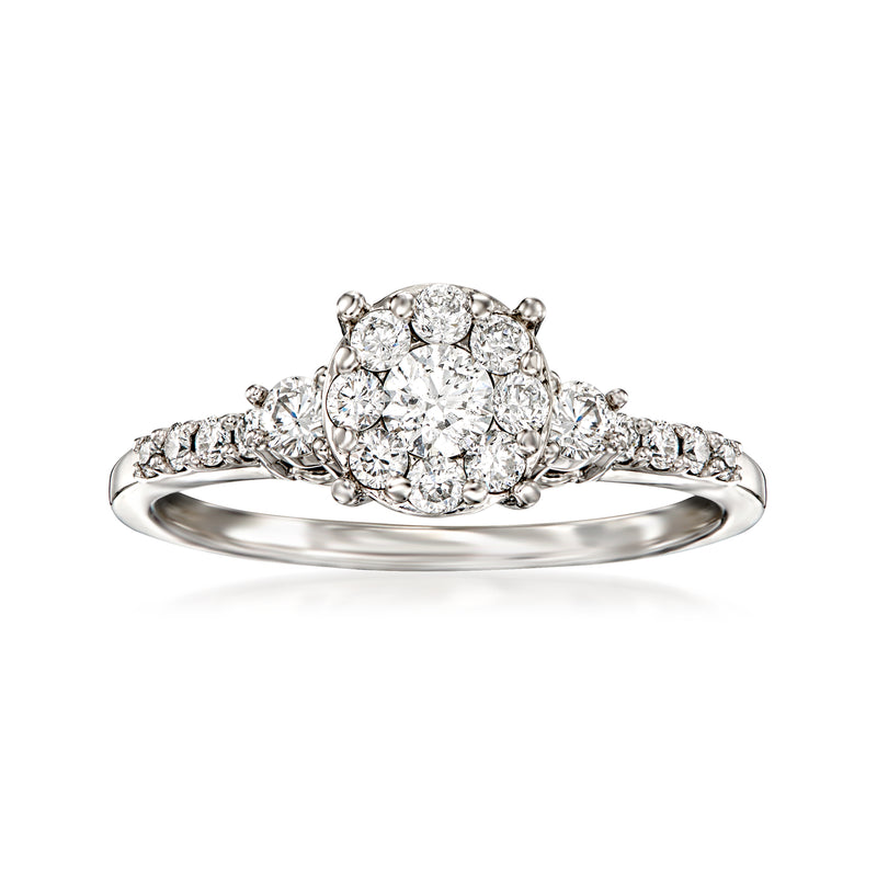 Vintage diamond cluster ring in 14kt white gold, oval center with round diamonds