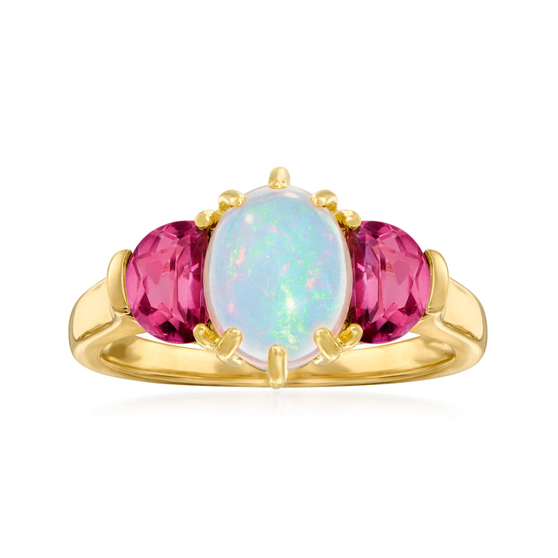 14kt yellow gold ring with oval opal center and pink gemstone side stones