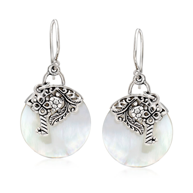 Sterling silver drop earrings with round mother-of-pearl discs and filigree charms
