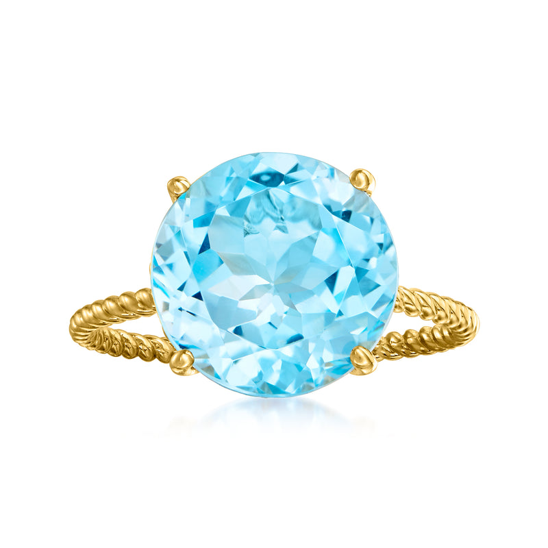 Sky blue topaz twisted ring, oval gemstone in 14kt yellow gold twisted band
