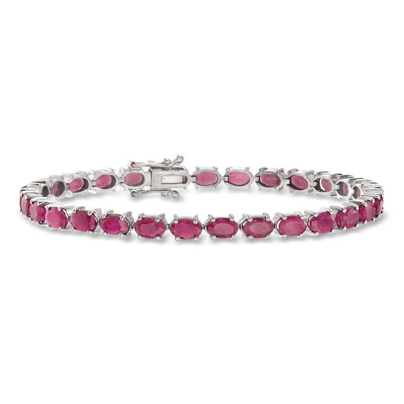 Sterling silver ruby tennis bracelet with oval pink gemstones, hinged row setting