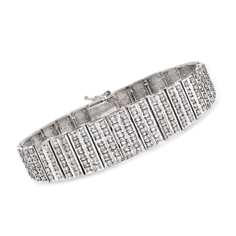 Platinum diamond bracelet with channel-set rectangular rows and hinged clasp