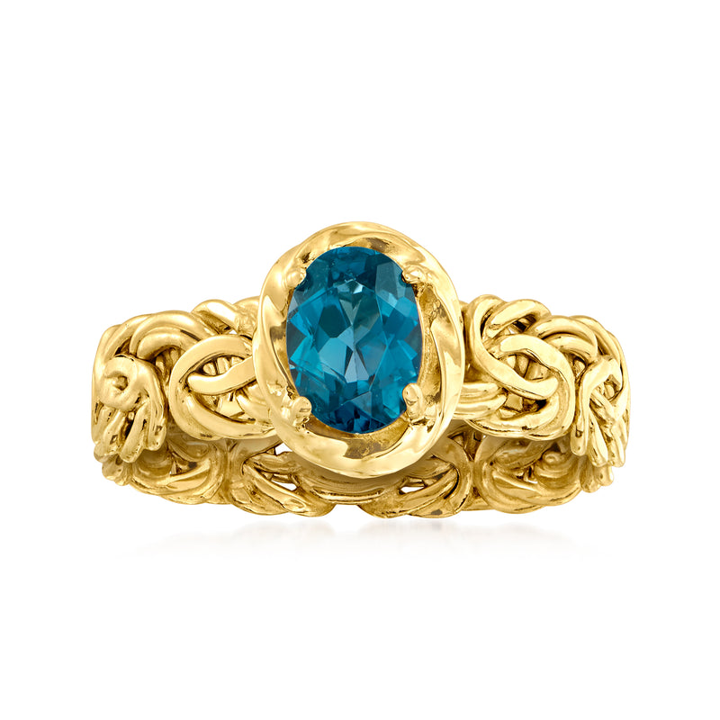 14kt yellow gold Byzantine ring with oval London blue topaz center stone