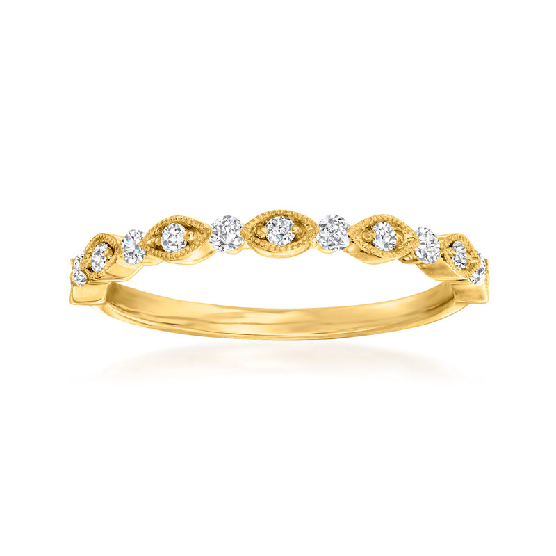 18kt yellow gold diamond wedding band with oval and round diamond accents