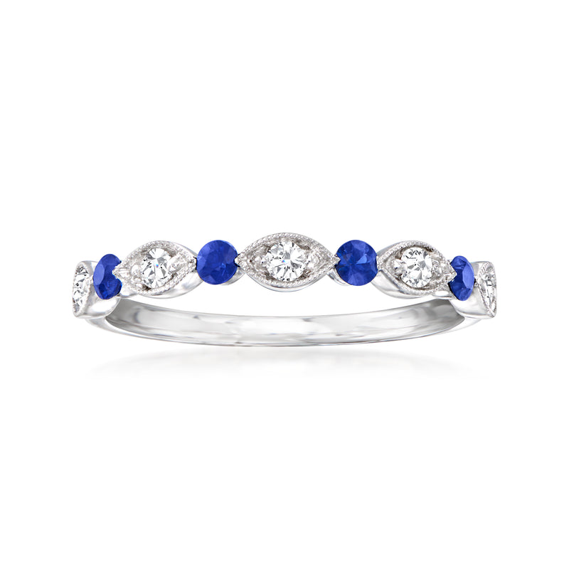 18kt white gold diamond and sapphire ring with blue oval stones and round diamond accents