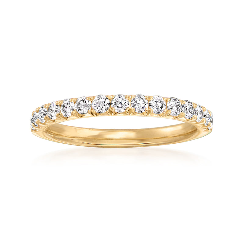 14kt yellow gold pave diamond wedding band with round stones along the top