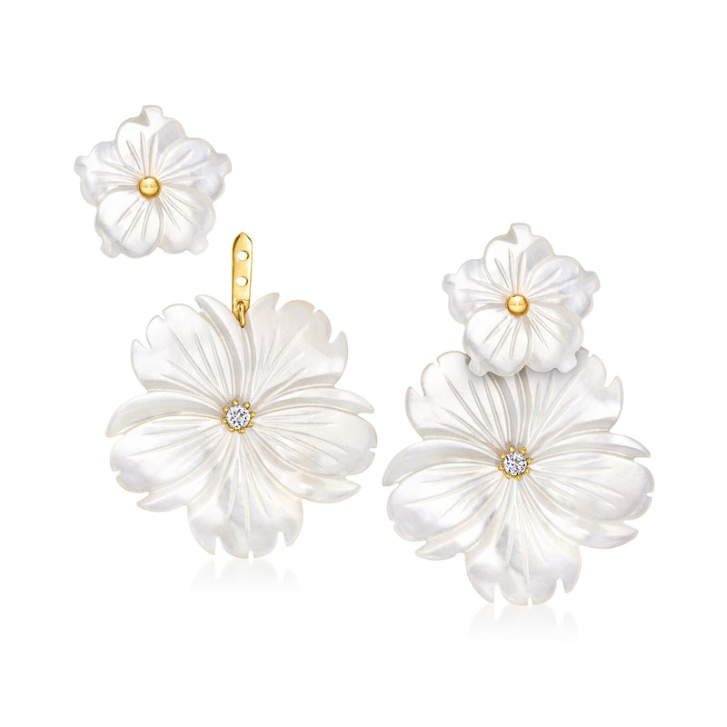 White mother-of-pearl flower drop earrings with gold posts and topaz sparkle centers