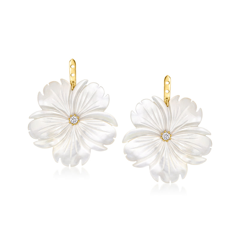 White mother-of-pearl flower drop earrings with gold hooks and a large center stone
