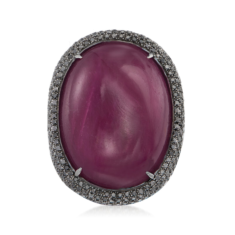 Oval ruby gemstone ring in 18kt white gold with black diamond halo