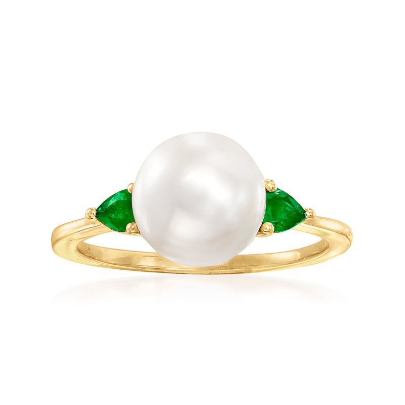 14kt yellow gold ring with large white cultured pearl and green emerald accents