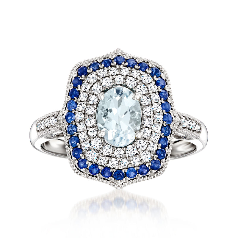 Aquamarine halo diamond ring with sapphire frame in 14kt white gold, oval center