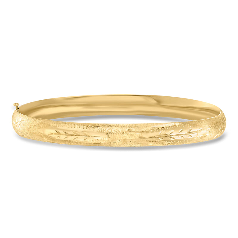 14kt yellow gold bangle bracelet with floral engraving