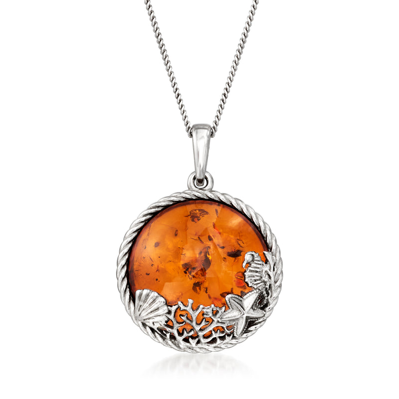 Sterling silver pendant necklace with round amber sea life charm
