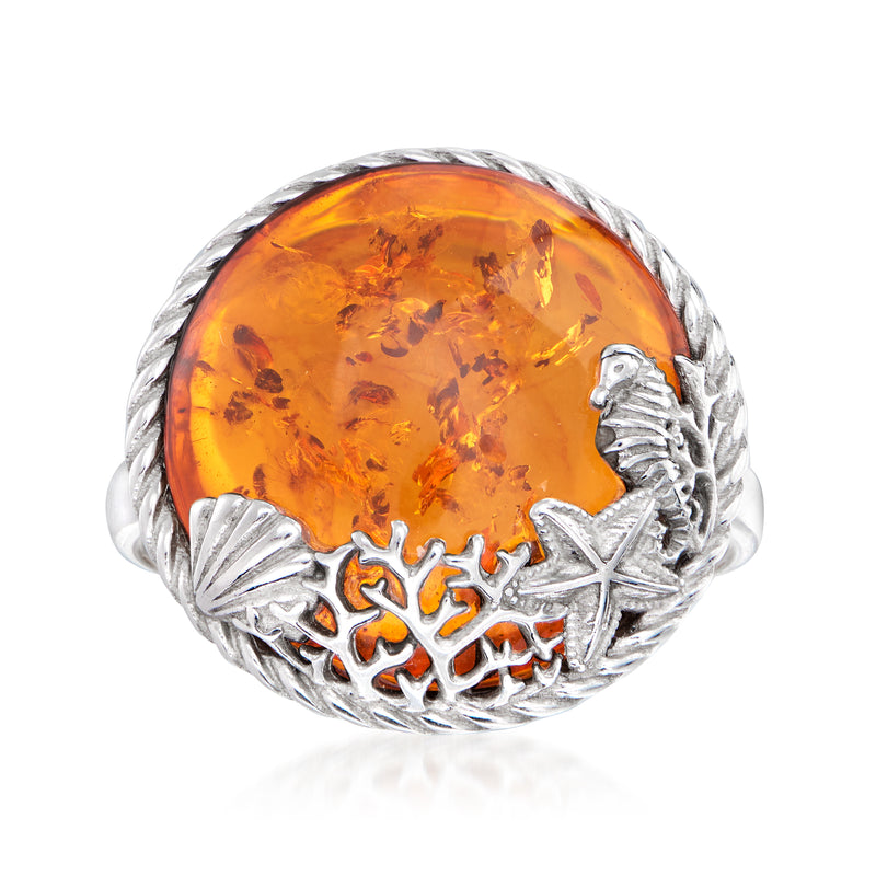 Sterling silver sea life ring with oval amber orange cabochon and shell motifs