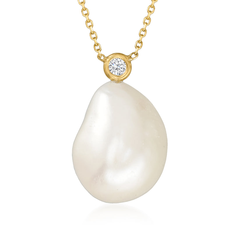 14kt yellow gold necklace with large white baroque pearl and round diamond-accent bail