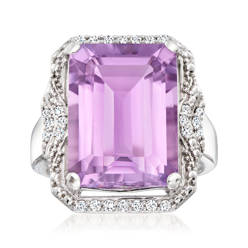Sterling silver ring with emerald-cut amethyst center and diamond halo