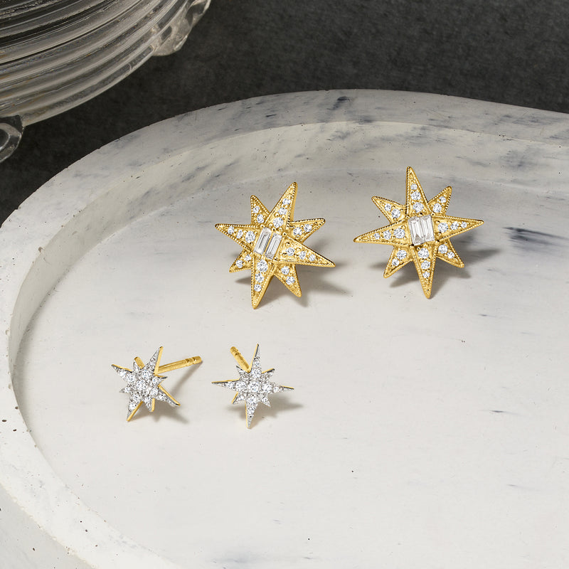 Diamond star stud earrings with yellow- and white-gold settings