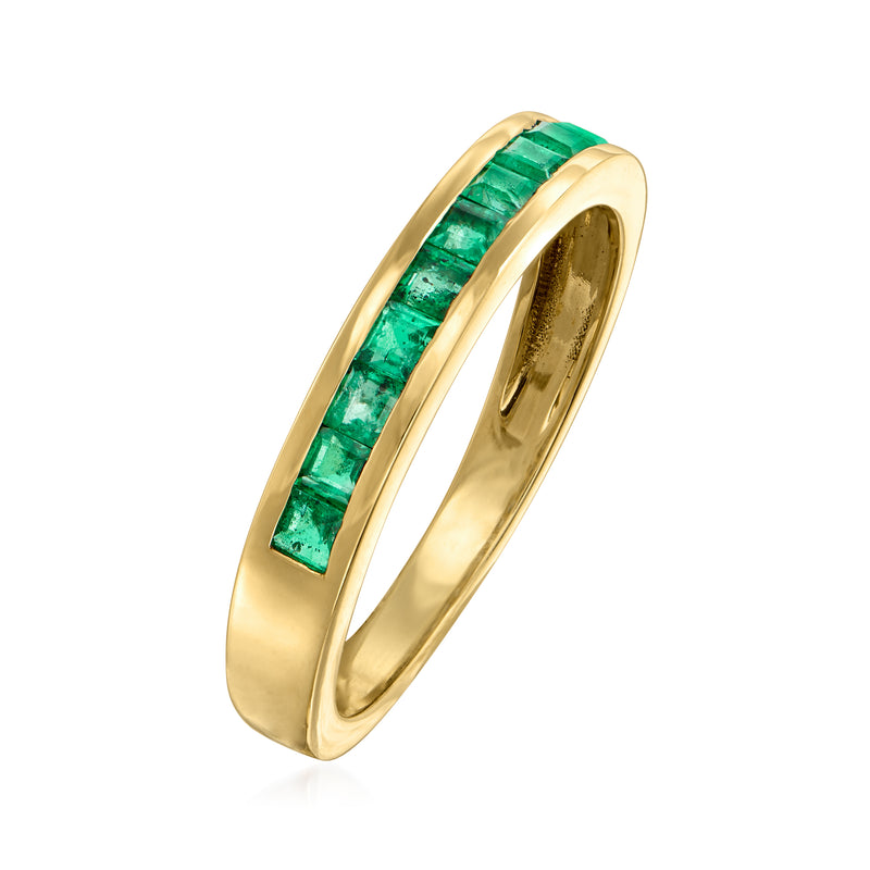 Slim 14kt yellow gold emerald ring with channel-set green stones, side view