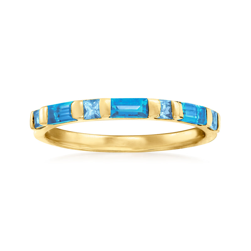 14kt yellow gold ring with blue topaz gemstone row across the band