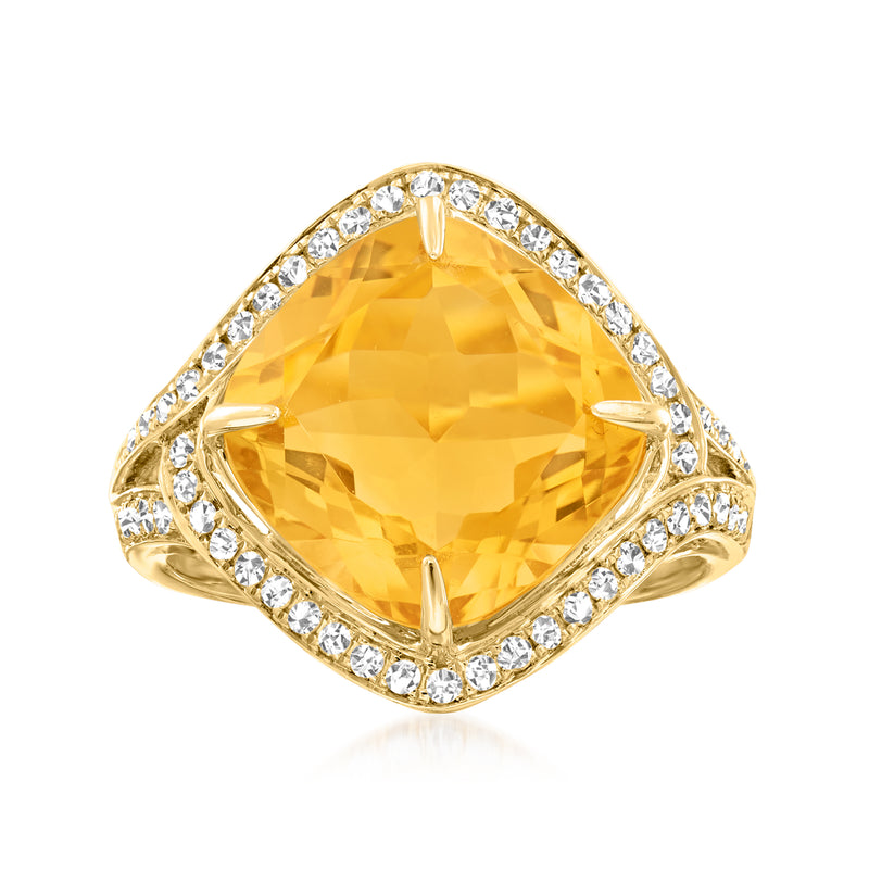 14kt yellow gold ring with oval citrine center and diamond halo
