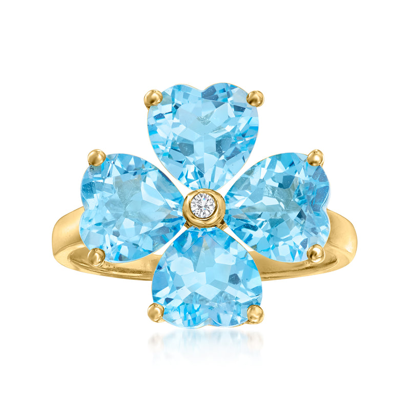 14kt yellow gold flower ring with Swiss blue topaz petals and diamond center
