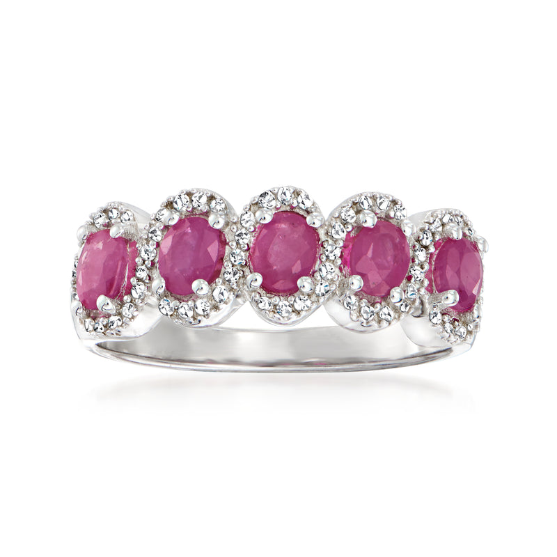 Sterling silver ring with five oval pink ruby stones and small clear diamond accents