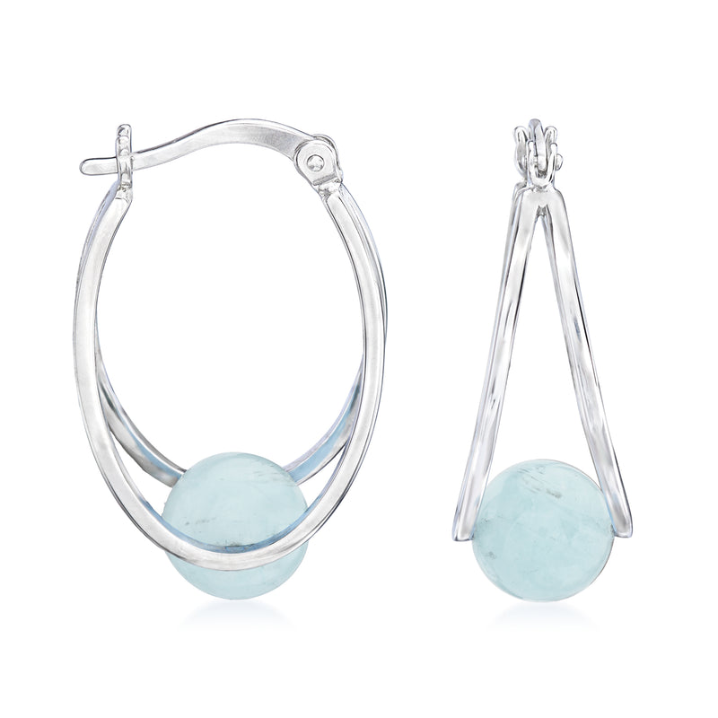 Sterling silver double-hoop earrings with oval light blue aquamarine gemstone, side view