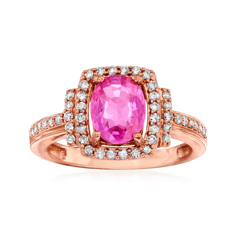 Rose gold ruby and diamond ring with halo setting