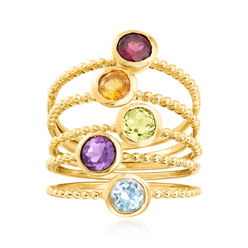 Five gold-tone rings with round multi-gemstones: purple, blue, green, orange, pink