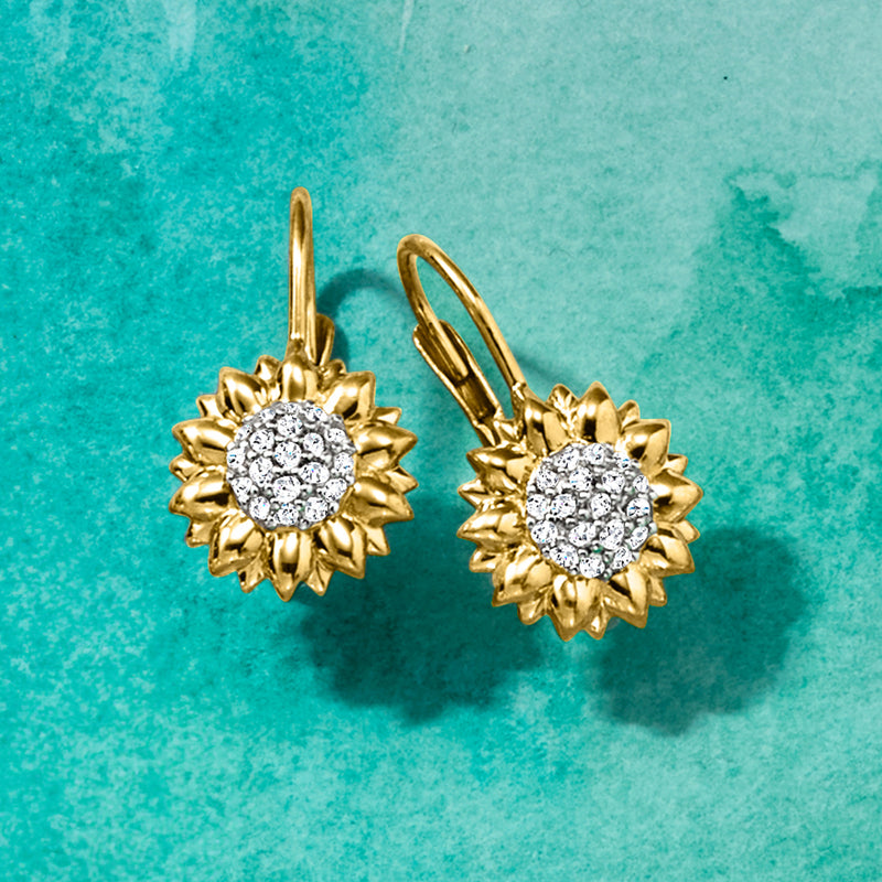 Gold sunflower earrings with round white stone cluster and leverback closures