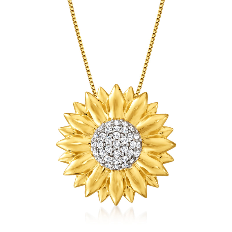 Gold sunflower pendant necklace with round jeweled center on a chain