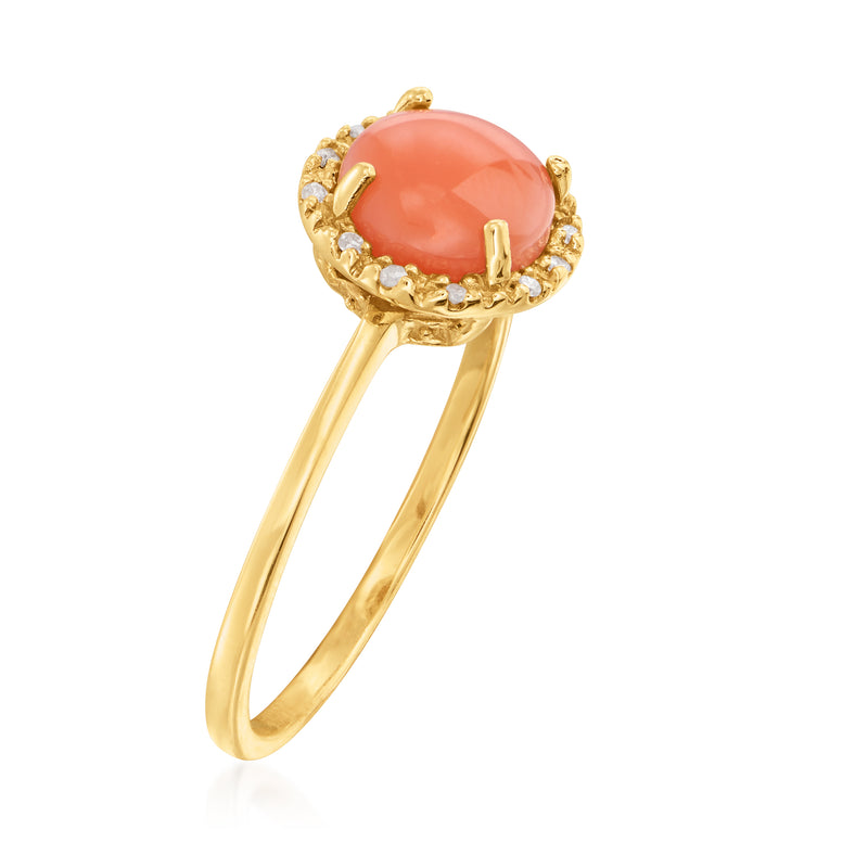 Oval coral cabochon ring with diamond halo, 14kt yellow gold band