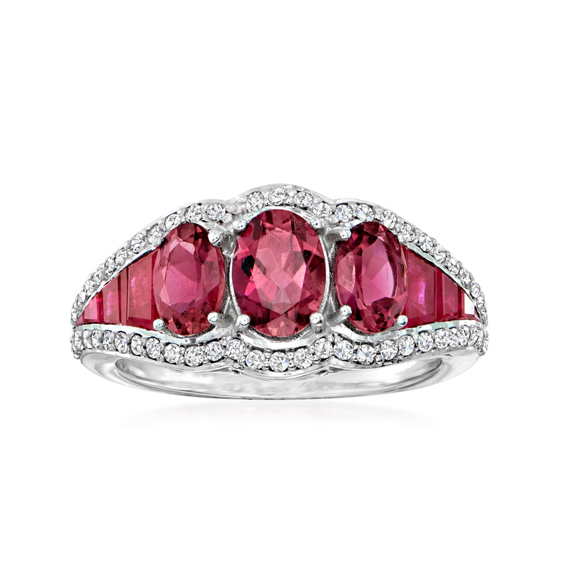 14kt white gold ring with three pink-red oval gemstones and diamond accents
