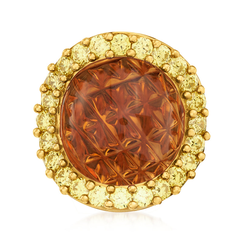 Vintage cocktail ring with oval citrine centerpiece, round gold halo and bead accents