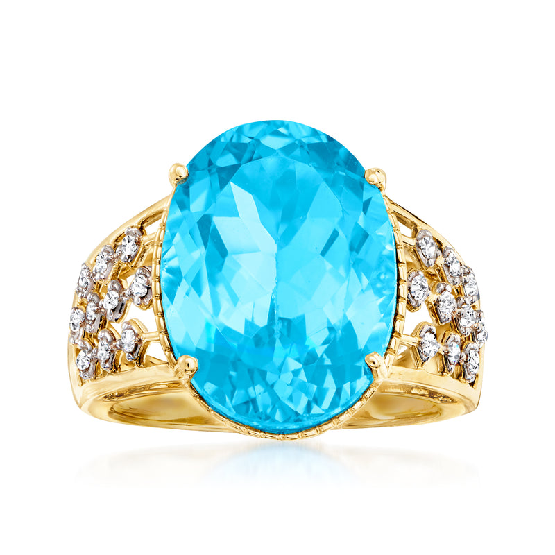 14kt yellow gold ring with oval Swiss blue topaz and round diamond accents