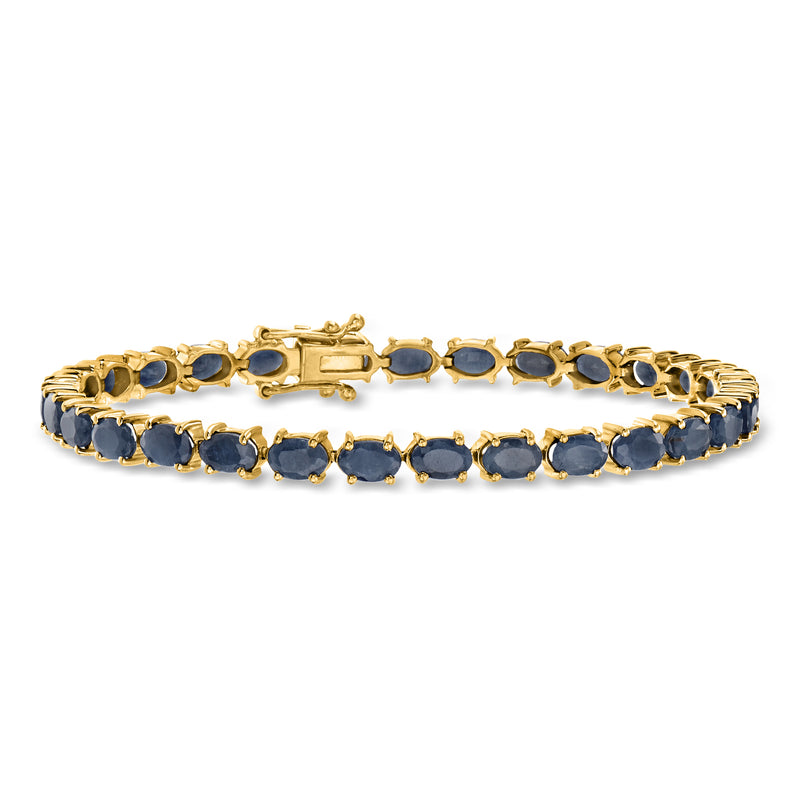 Gold over sterling sapphire tennis bracelet with oval dark blue stones