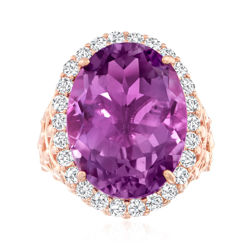 Oval amethyst ring with white zircon halo and rose-gold prong setting