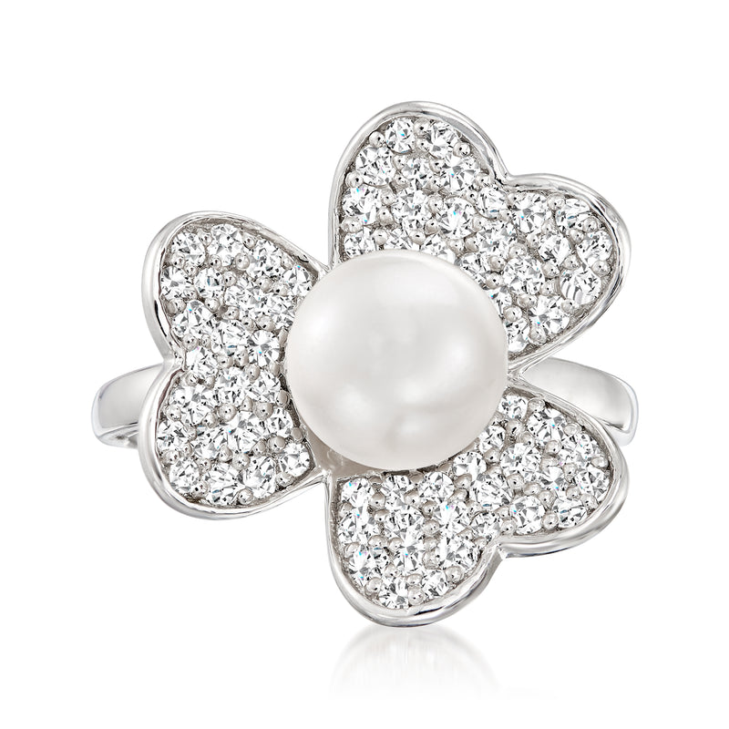 Sterling silver flower ring with round cultured pearl center and white gemstone petals