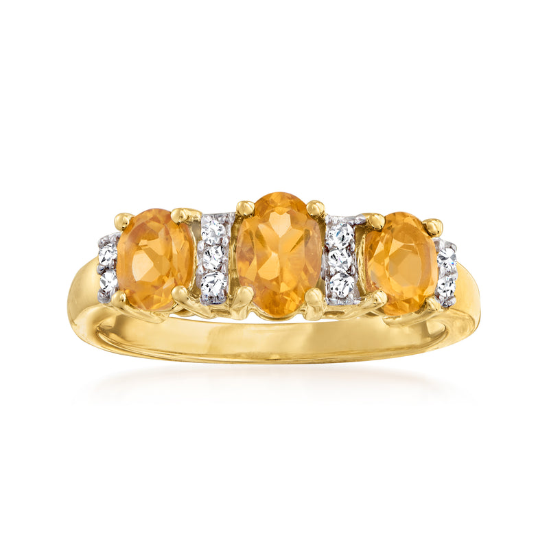 14kt yellow gold three-stone ring with cushion citrine center and diamond accent sides