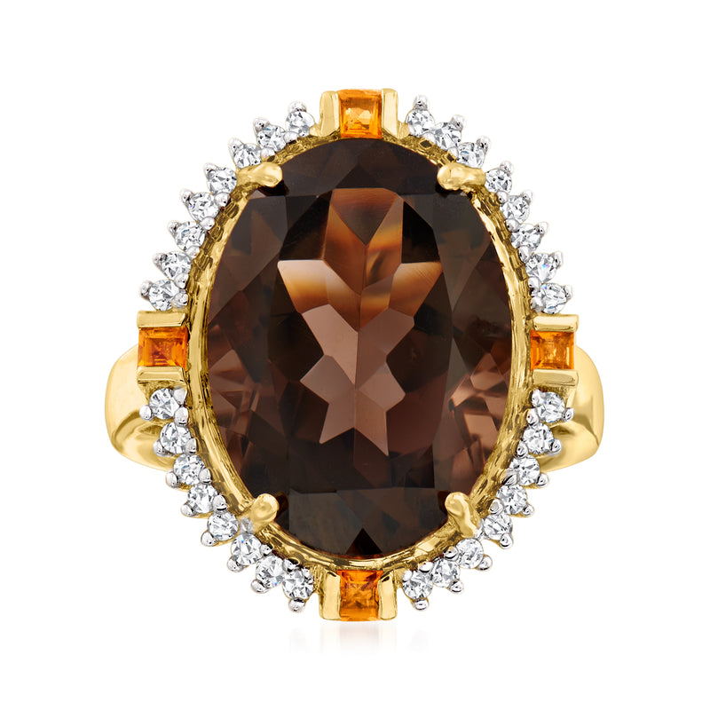 Gold ring with oval smoky quartz center, diamond halo, and yellow square side accents