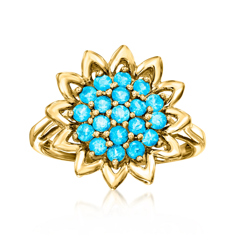 Sunflower ring with blue apatite stones in 18kt gold setting